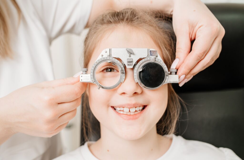 Child wearing trial frames.